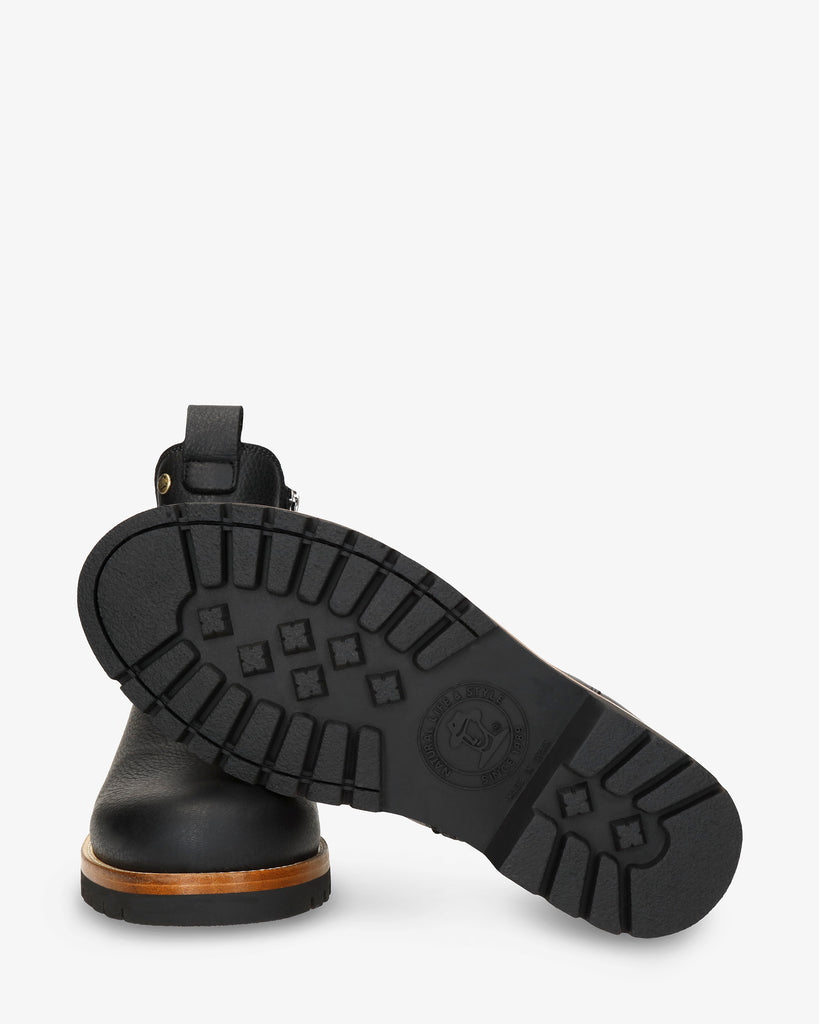 Beny Igloo botín de piel con forro interior de pelo natural. negro