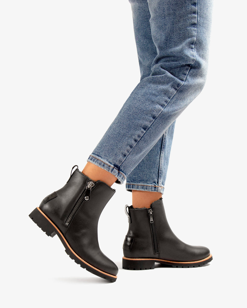 Fiore Trav botas de piel con forro interior de pelo. negro