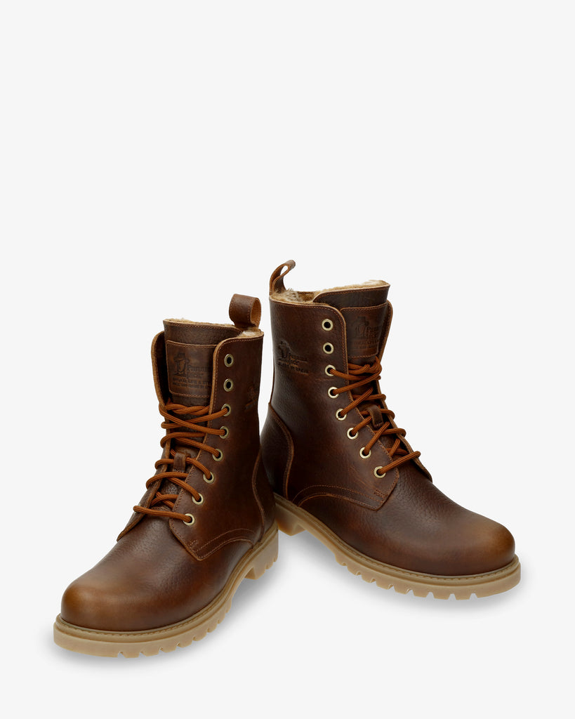 Frisia botas de piel con forro interior de pelo. cuero