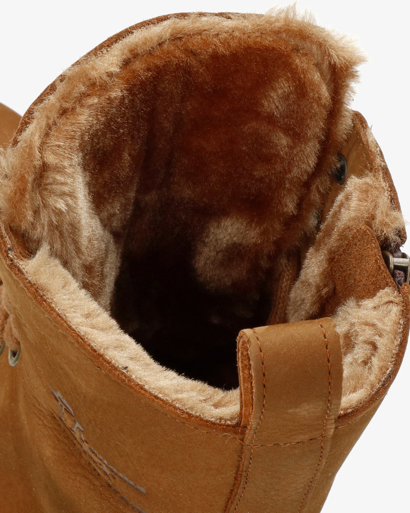 Frisia botas de piel con forro interior de pelo. cuero