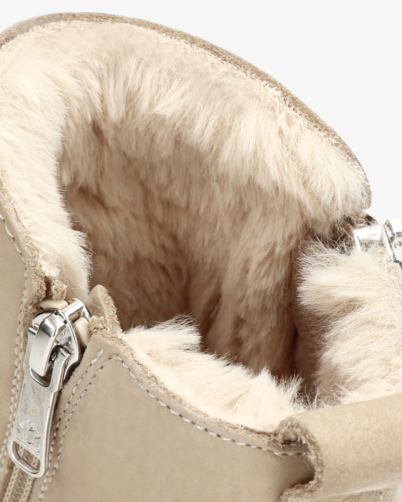 Pauline botín de piel con forro interior de pelo. crudo