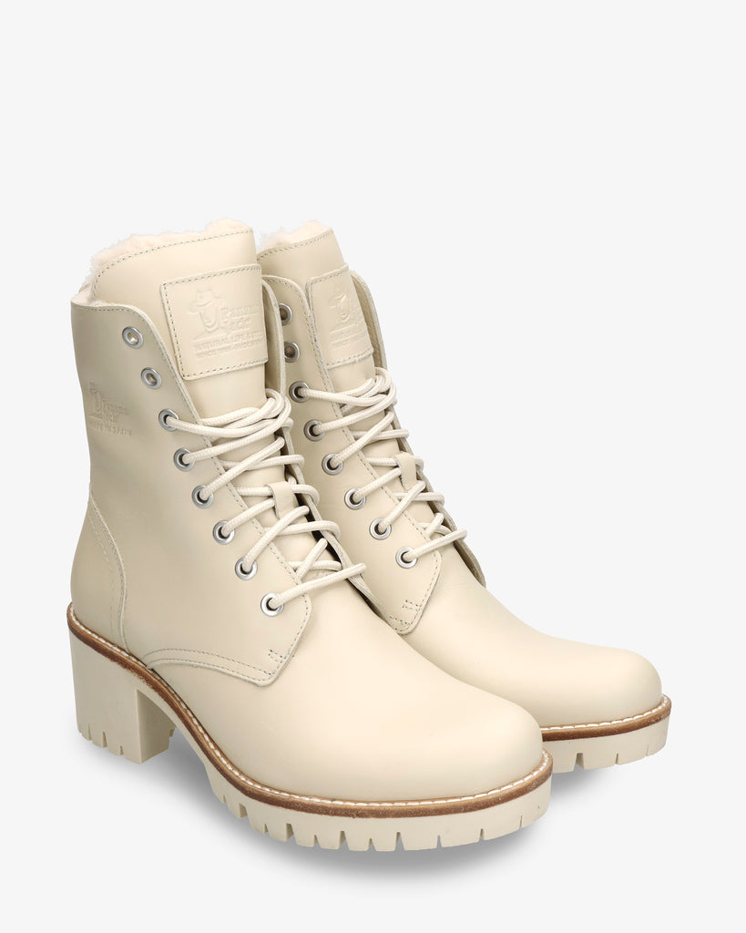 Polonia botas de piel con forro interior de pelo. crudo