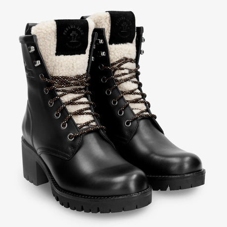 Tibi botas de piel con forro interior de pelo. negro