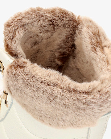 Tuscani botas de piel con forro interior de pelo. blanco